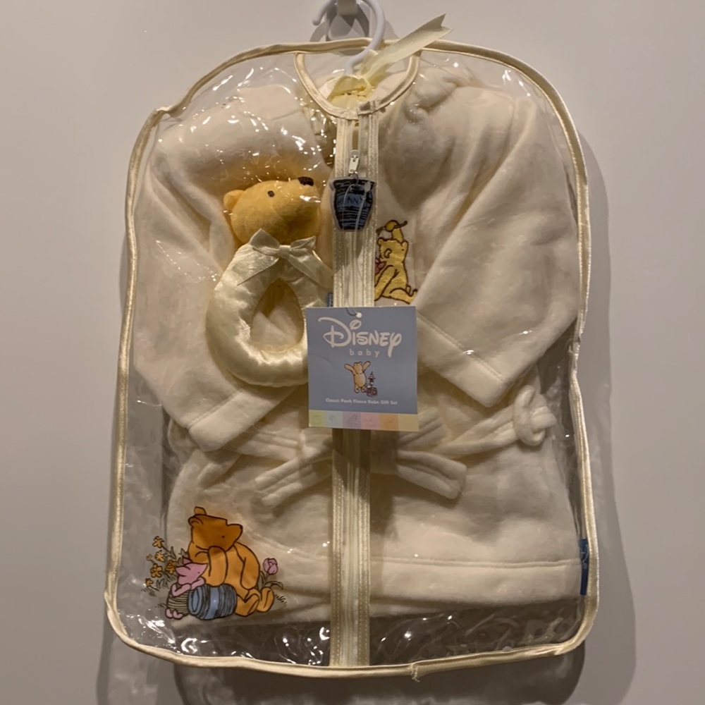Disney Baby Gift Set.  Robe and rattle in original packaging. Never worn, new.